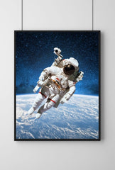 Cosmic Wanderer: Astronaut Above Earth Canvas Art