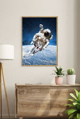 Cosmic Wanderer: Astronaut Above Earth Canvas Art