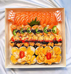 Ganfaner square wooden bento box filled with a salmon sashimi and sushi roll platter