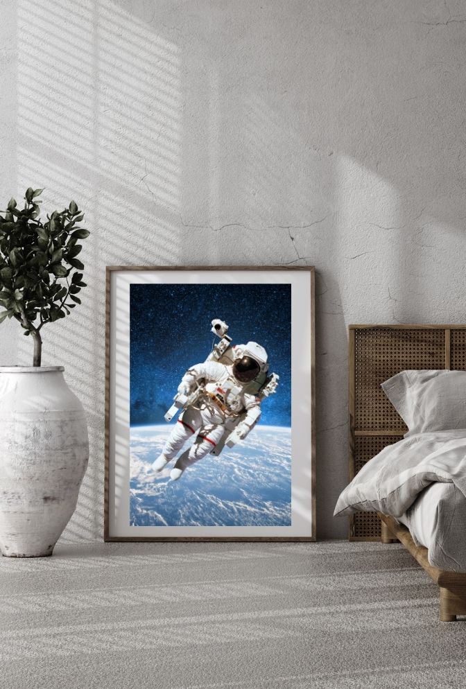Cosmic Wanderer: Astronaut Above Earth Canvas Art